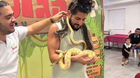 ילדי המשפחות המיוחדות במפגש עם בעלי חיים 4.jpg
